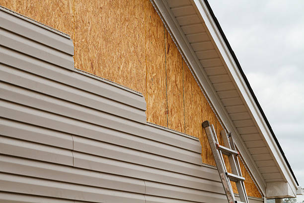 Professional Vinyl Siding technician working in North Granby, CT